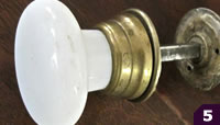 Milk glass doorknob with wide base